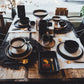 Noite Ofenform, Schalen und Teller auf Tisch